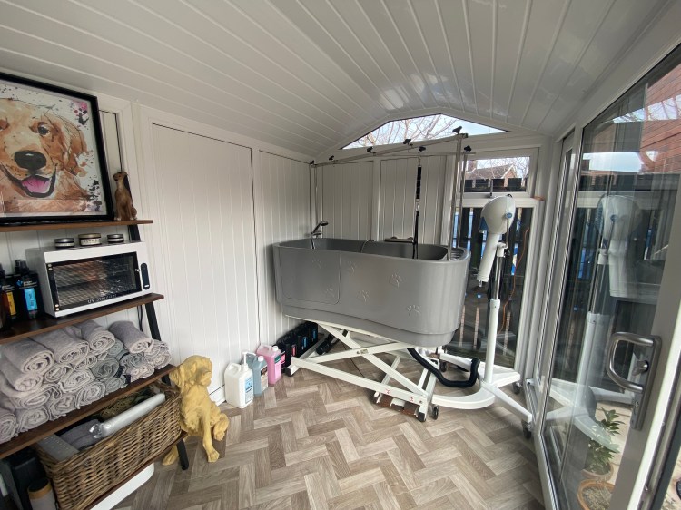 C.E.A. Dog Grooming home-based salon bathing area with electric bath